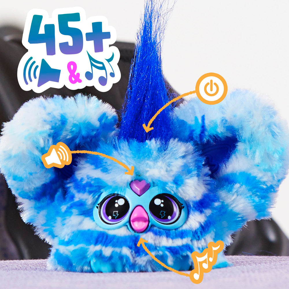 Furby Furblets ears pop open for playful surprise during playtime.