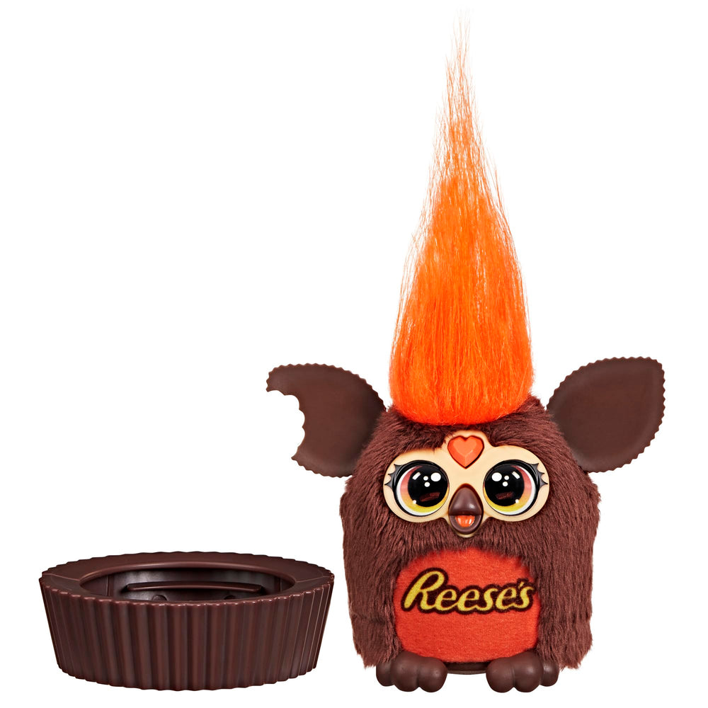 Furby Furblets gift-ready collectible candy plush on shelf.