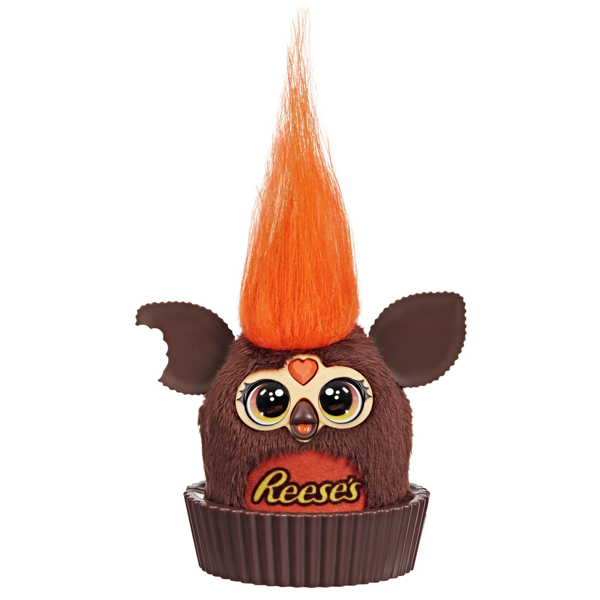 Furby Furblets Reese's cup mini sits in a pretend Reese's cup for display.