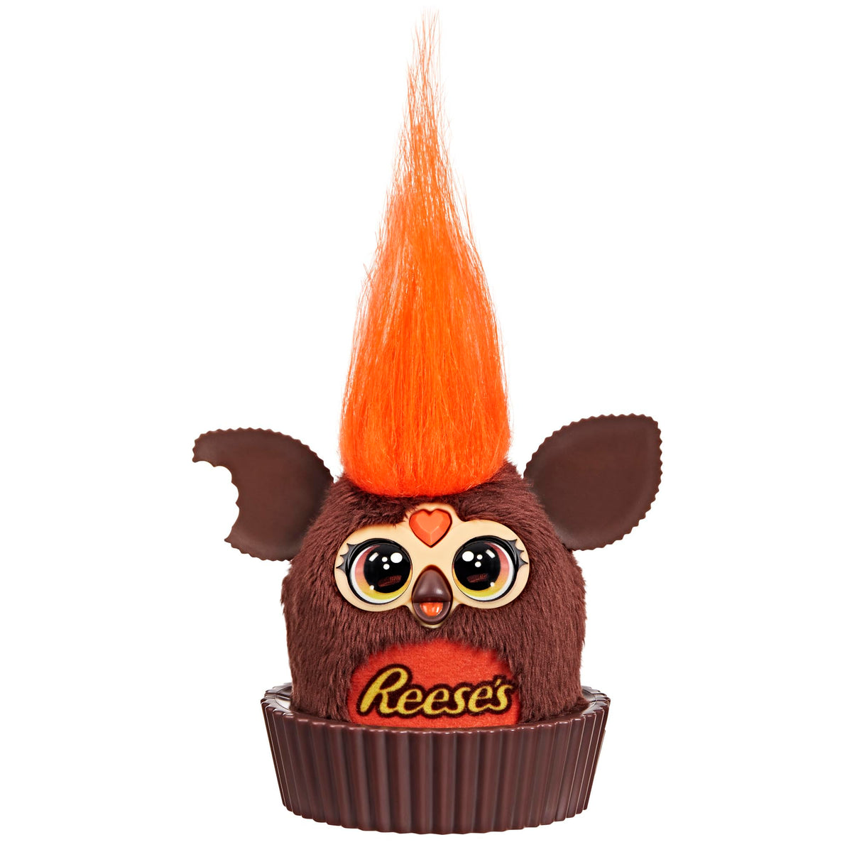 Furby Furblets Reese's cup mini sits in a pretend Reese's cup for display.