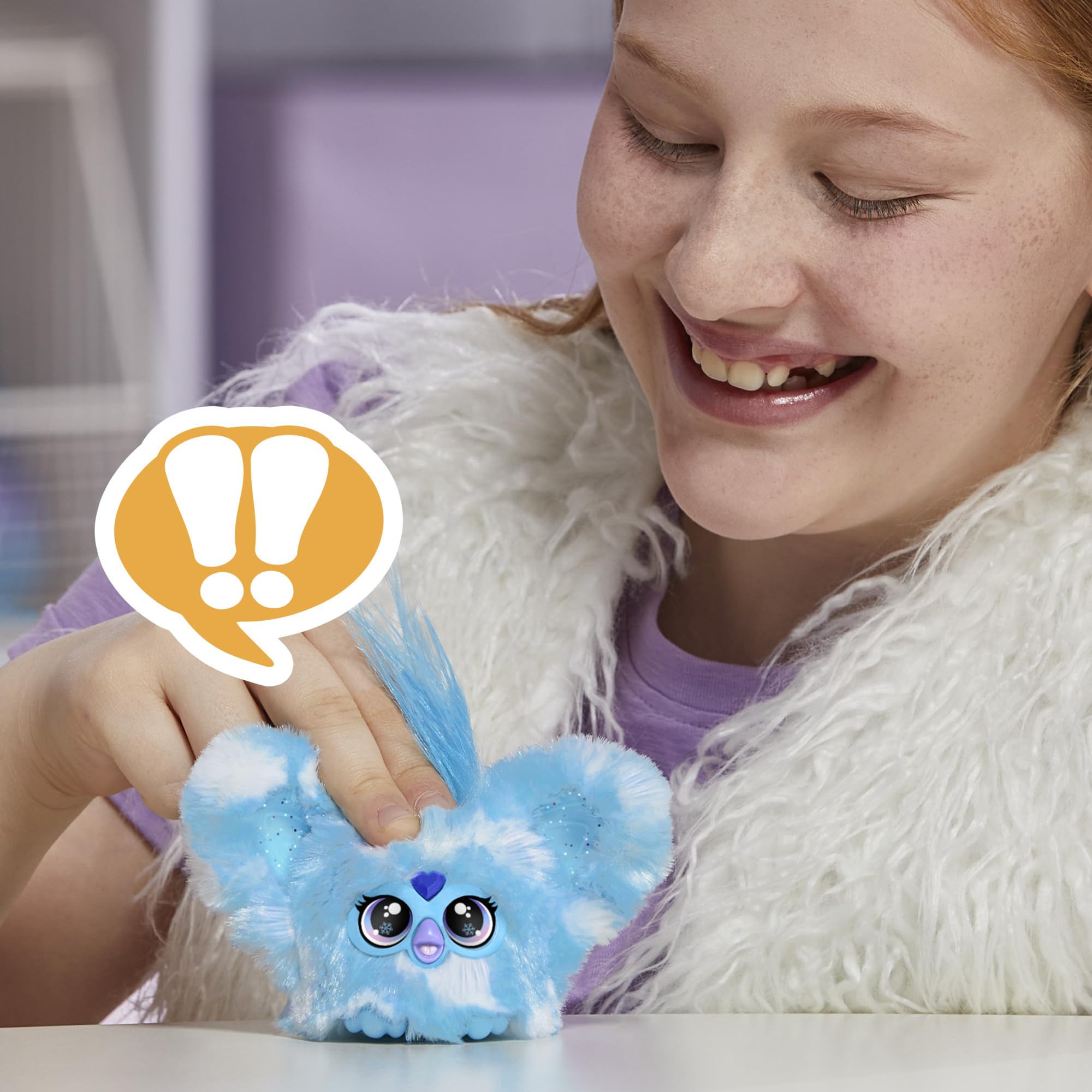 Furby Furblets Sno-Way peekaboo ears pop open for interactive surprise.
