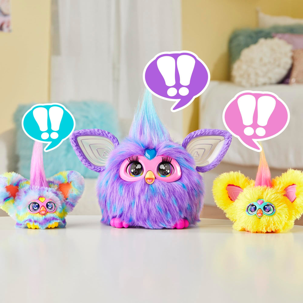 Furby Furblets travel toy clipped to a bag for adventures