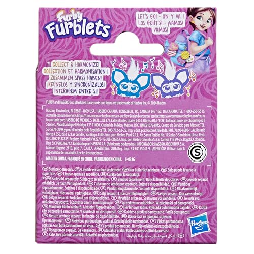 Blue-spotted fur Groo-Vee mini friend invites imaginative adventures.