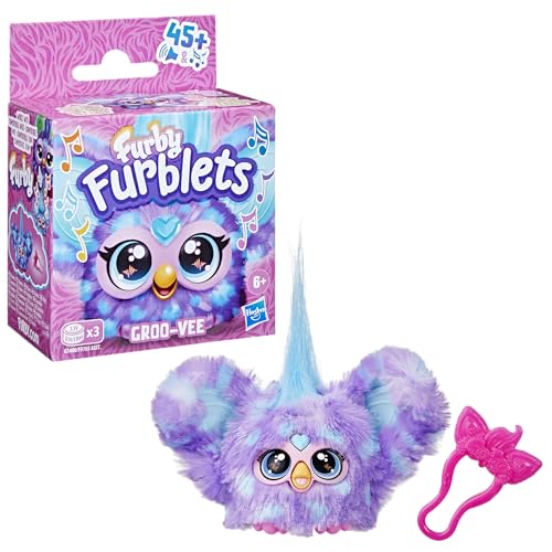 Purple fur Groo-Vee mini friend adds colorful vibes to playtime.