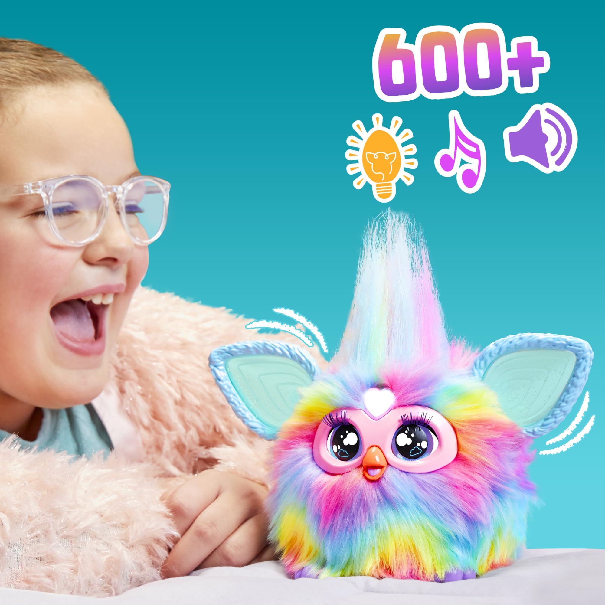 Furby heart gem activates voice modes for interactiveness.