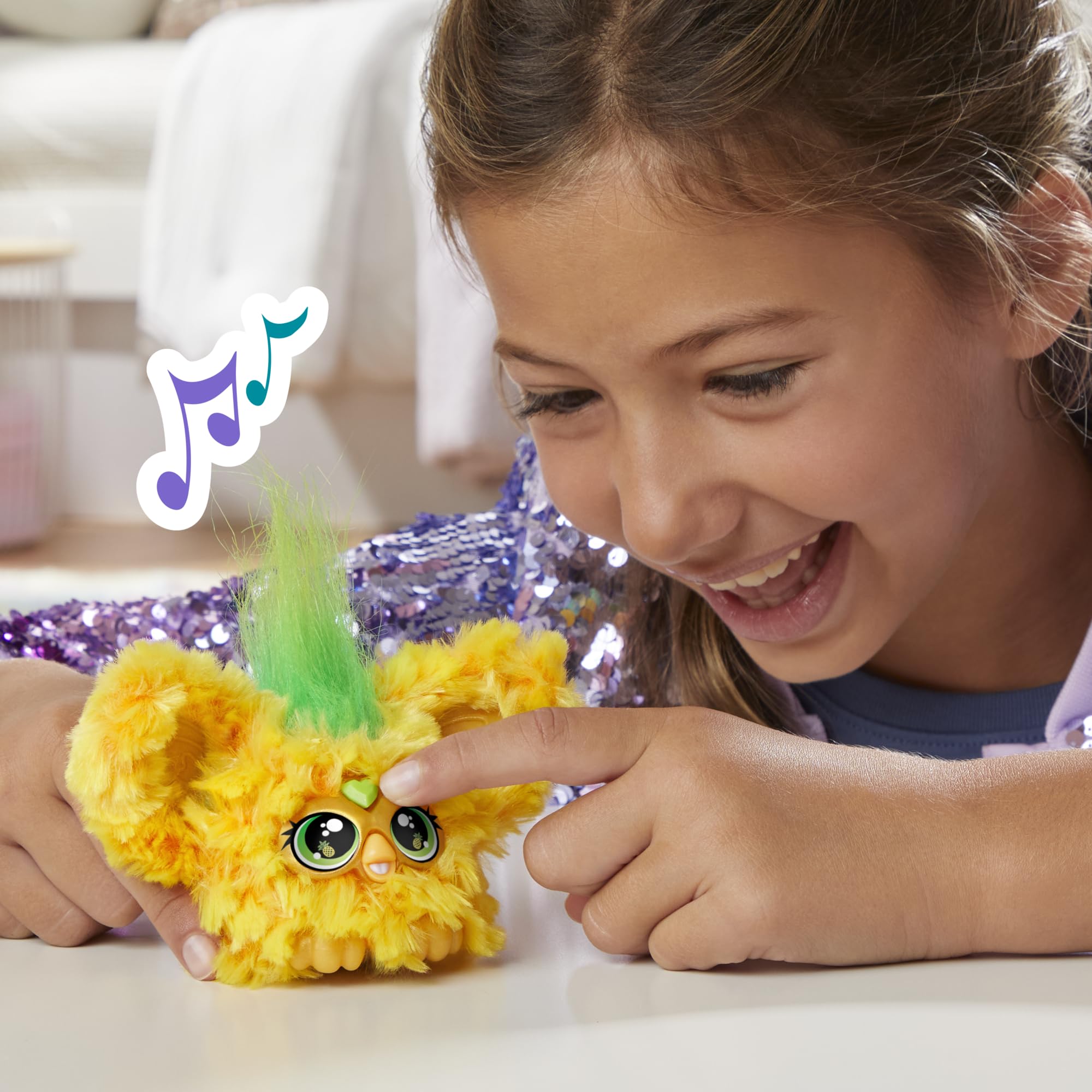 Peekaboo ears pop up for a cheerful tactile moment during play.
