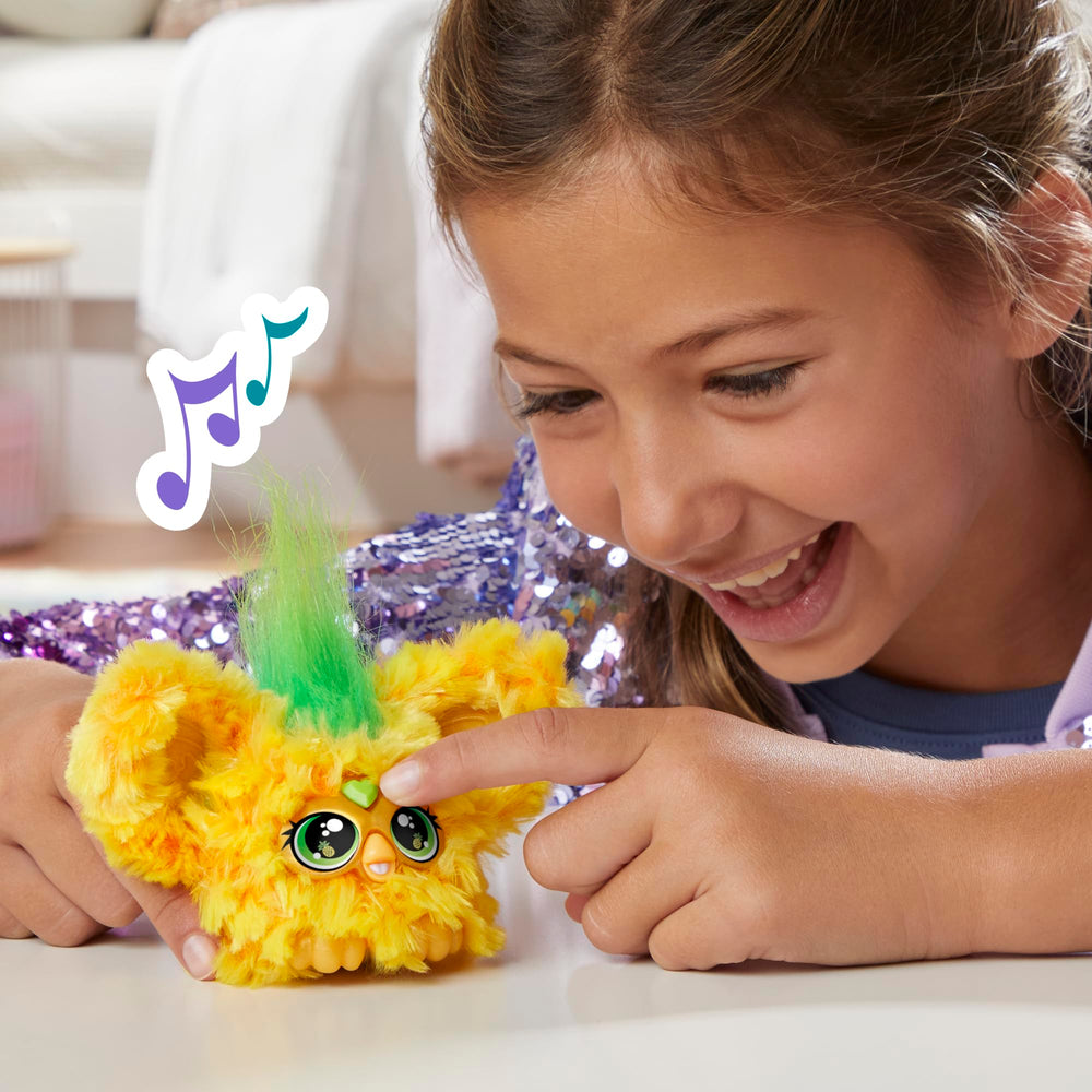 Peekaboo ears pop up for a cheerful tactile moment during play.