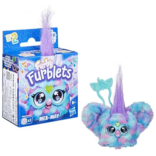 Furby Mer-May Furblets beak press activates feeding noises for interactive pretend meals.