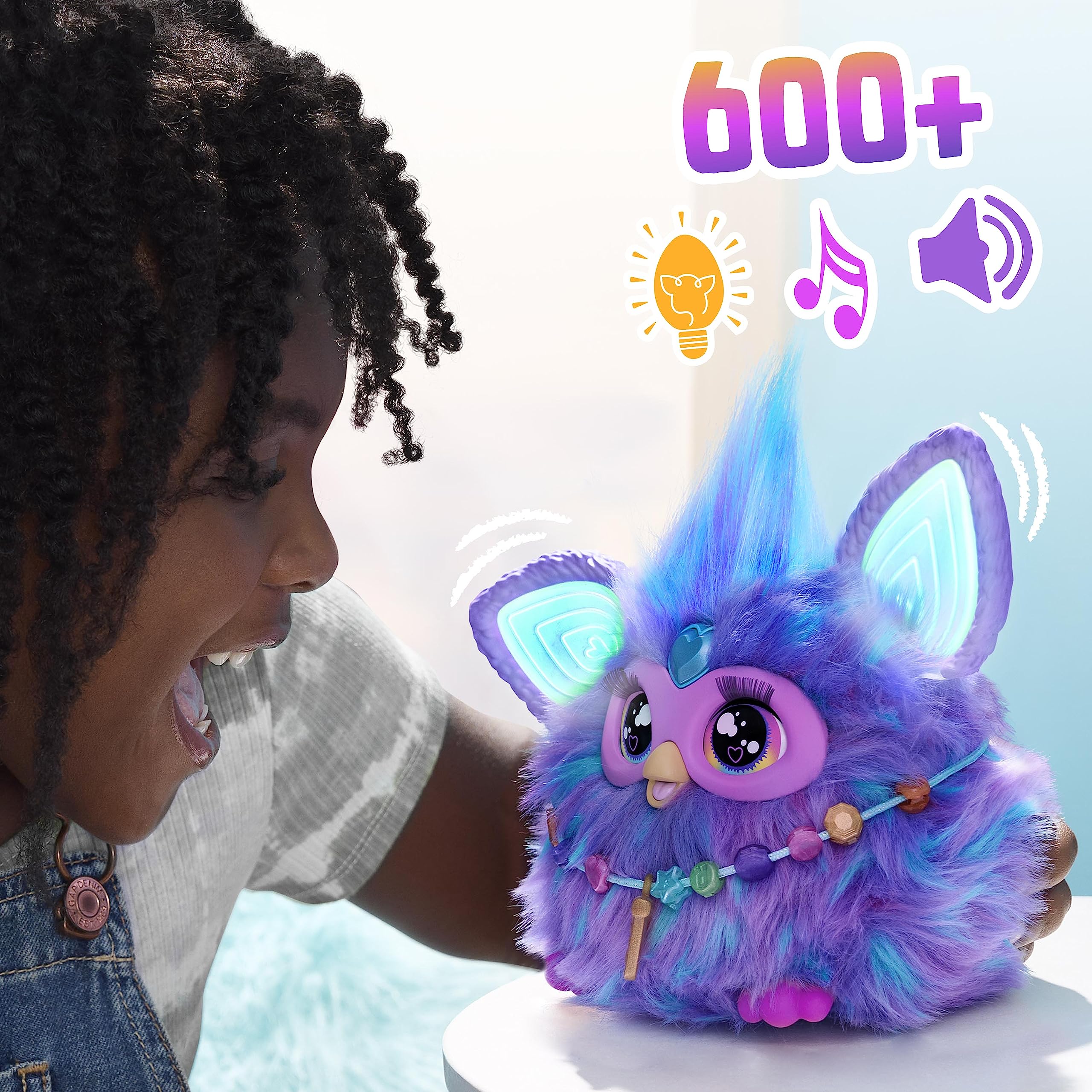 Furby Purple ears glow with color-changing lights during play