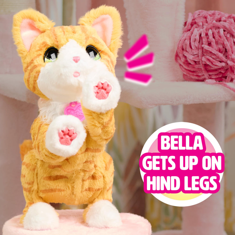 FurReal Bella sits on a lap inviting cuddles and pretend pet care moments.