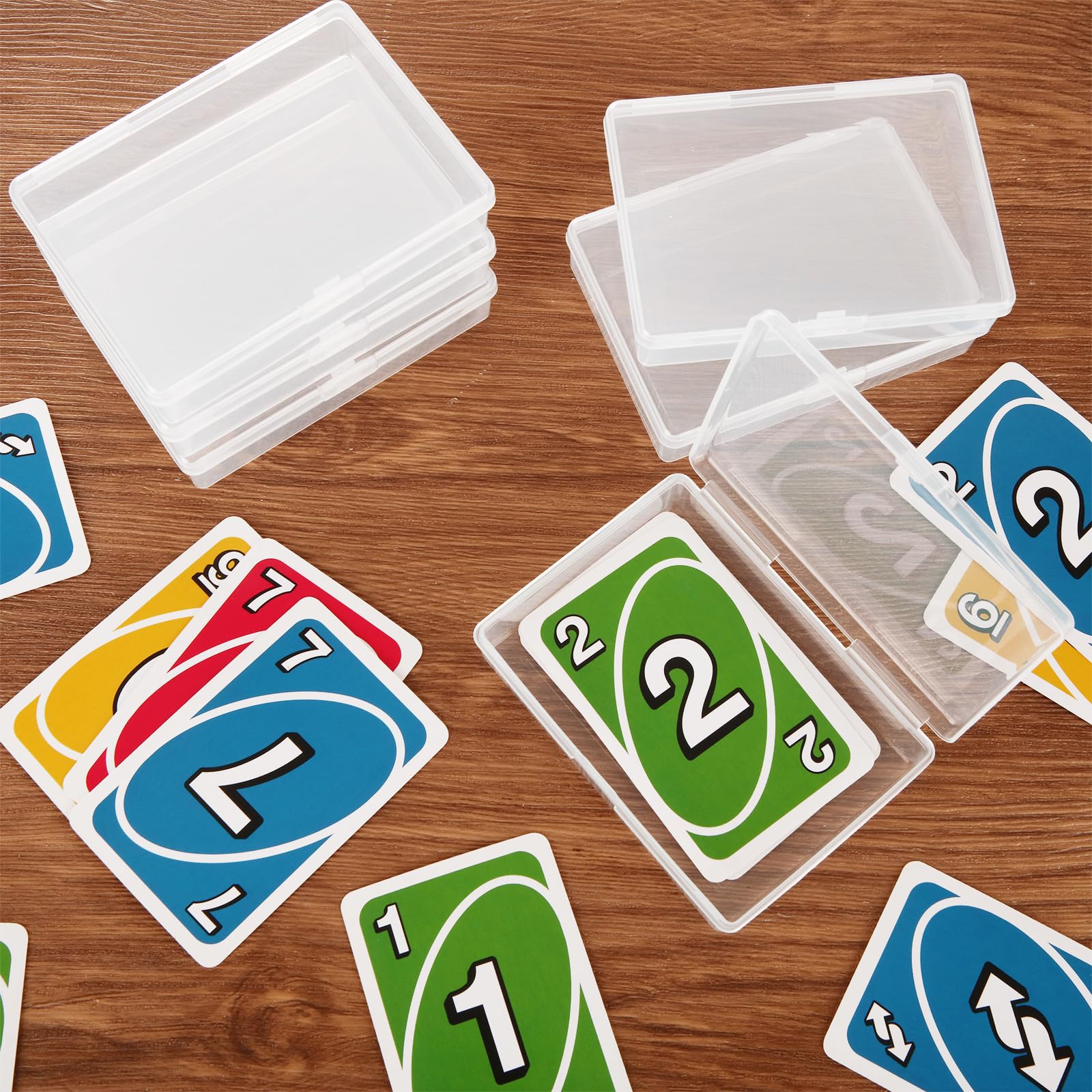 FVIEXE box stacked with cards demonstrates compact storage efficiency.