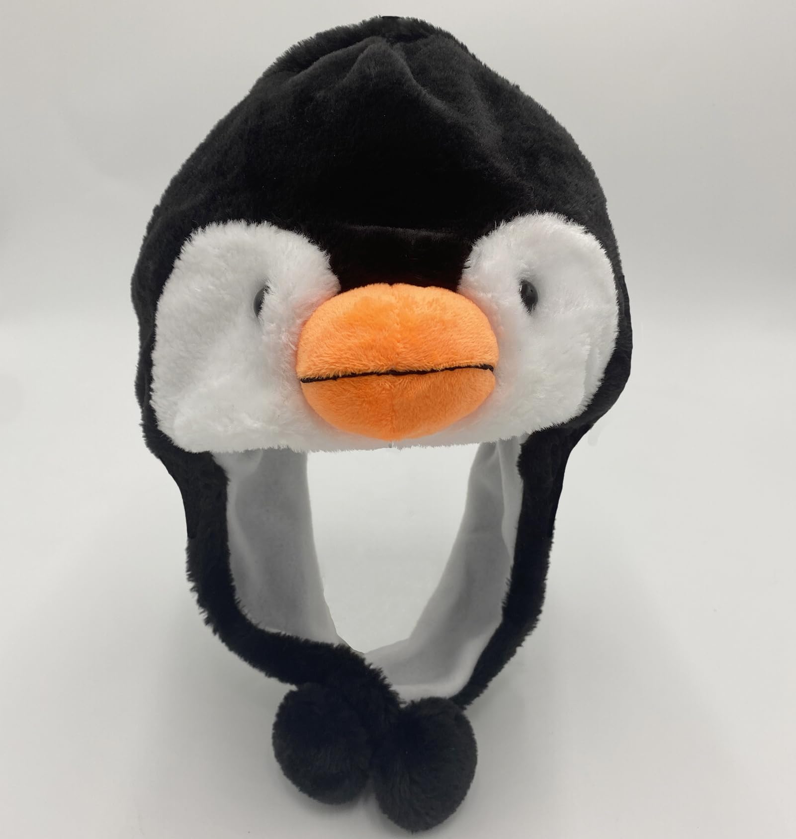 GADMEXILY penguin plush hat during Christmas season adds playful style.