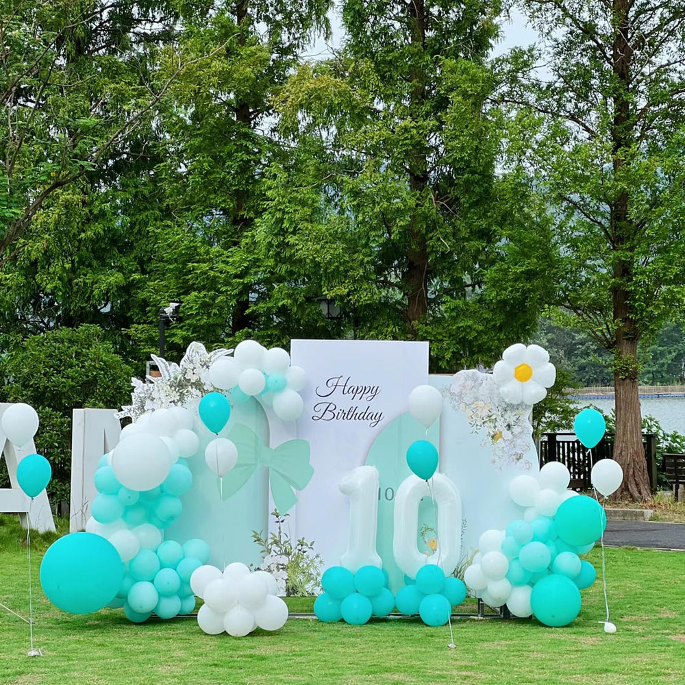 GaesQae teal balloons close-up, thickened latex built to resist popping.