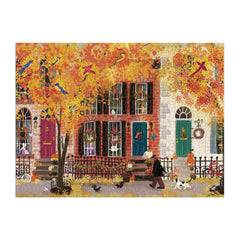 Galison Autumn in the Neighborhood puzzle artwork revealing a cozy fall street scene.