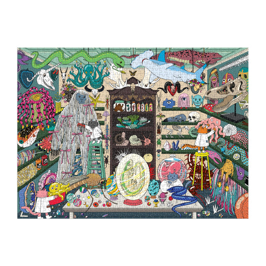 Galison World of Curiosities' humorous illustrations spark curiosity during puzzle night.
