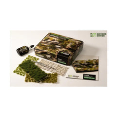 Gamers Grass Tuft Starter Box close-up showing vibrant green tufts for realistic dioramas.