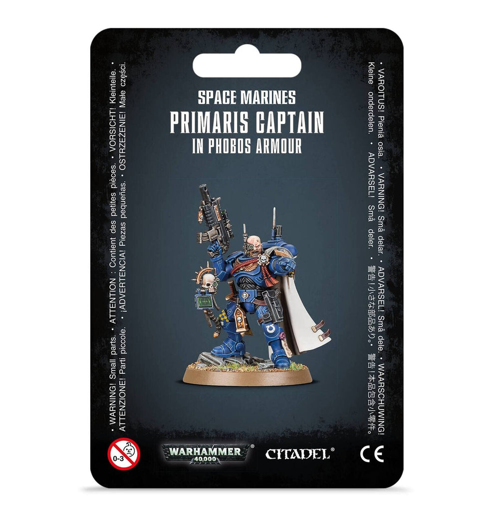 Games Workshop Space Marine Captain in Phobos Armour standing with bolt carbine for tactical presence.