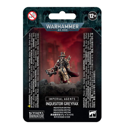 Games Workshop Inquisitor Greyfax model in dynamic pose for painting.