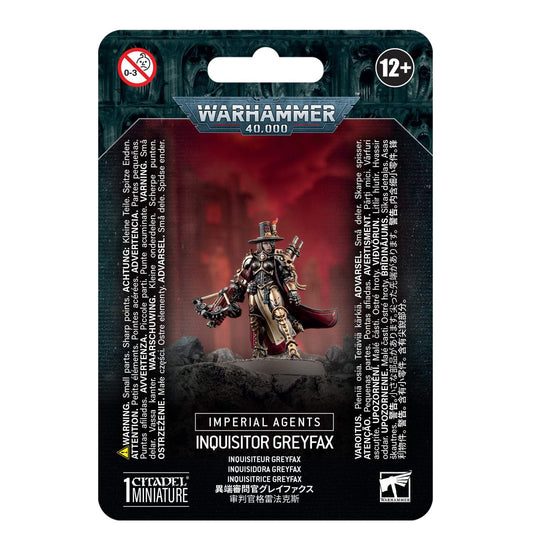 Games Workshop Inquisitor Greyfax model in dynamic pose for painting.
