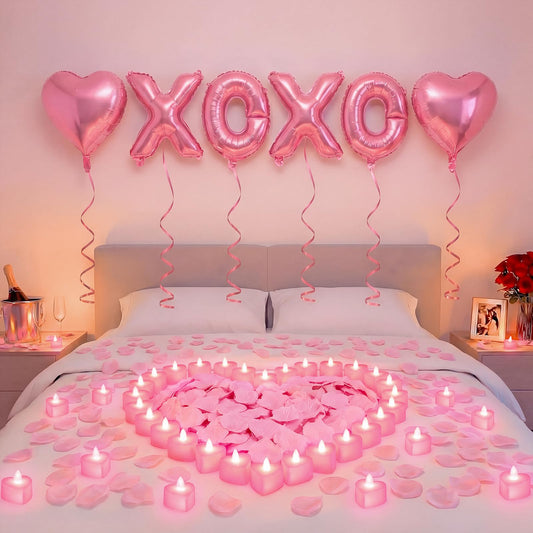 Ganeen pink XOXO letters balloons create a playful romantic centerpiece.