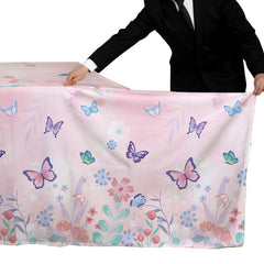 Gatherfun butterfly tablecloth brightens birthday scenes and pairs with purple décor.