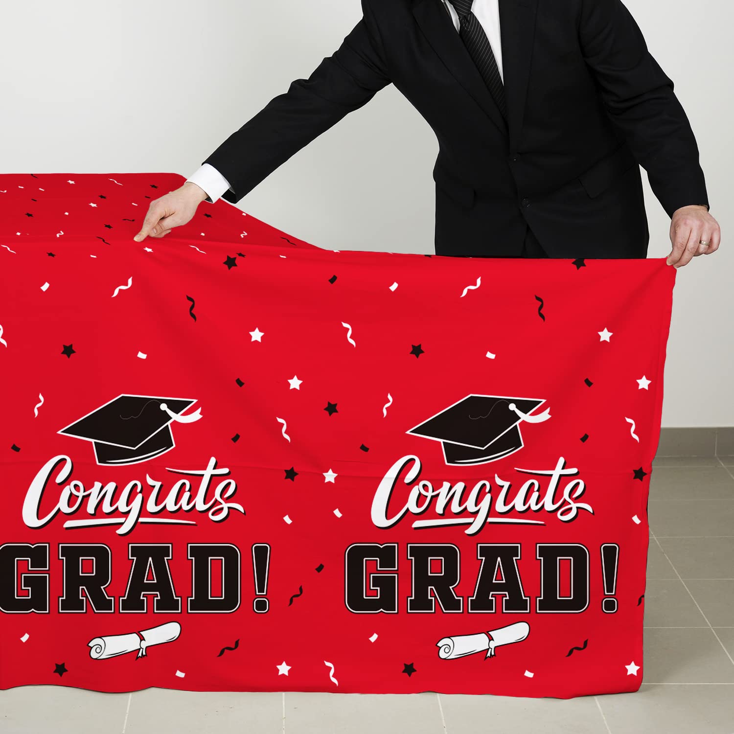 Gatherfun three-pack graduation tablecloths displayed on table