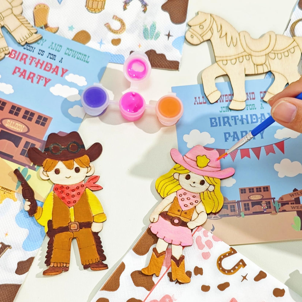 GEECOZYLIFE mini watercolor paints add vibrant color to wooden figures.