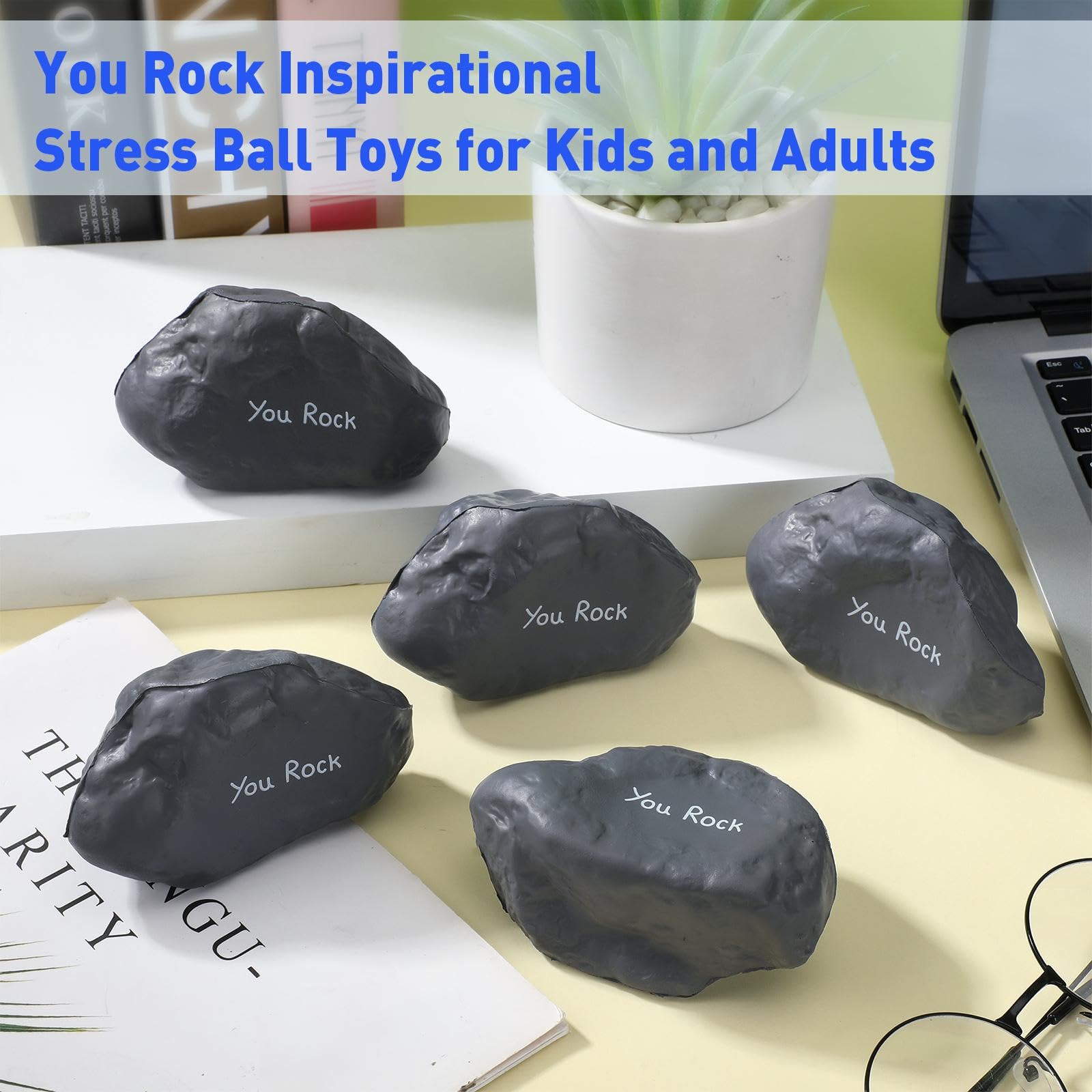 Gemscream office stress ball in hand supports concentration during long workdays.