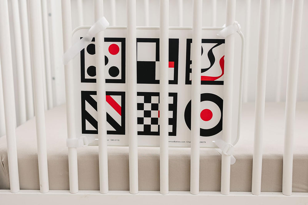 Genius Baby Toys crib attachment with velcro for secure mounting