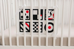 Genius Baby Toys crib attachment with velcro for secure mounting
