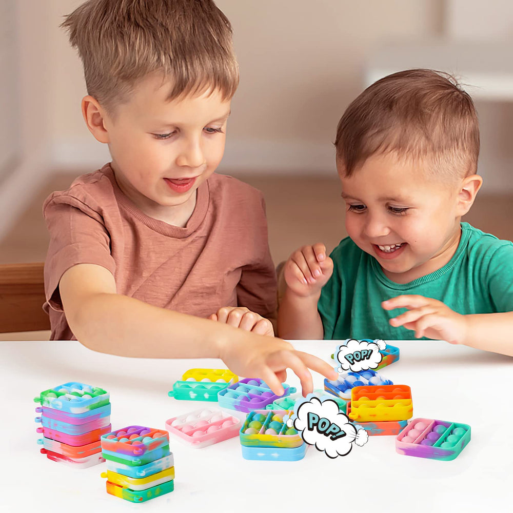 Genuvi mini pop keychain in bright colors for party favors and on-the-go fun