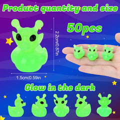 GGSTDDUP alien ducks cow-patterned resin ducks add whimsy to shelves.