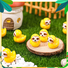 GGSTDDUP resin sloth duck garden decor adds whimsy to outdoor spaces.