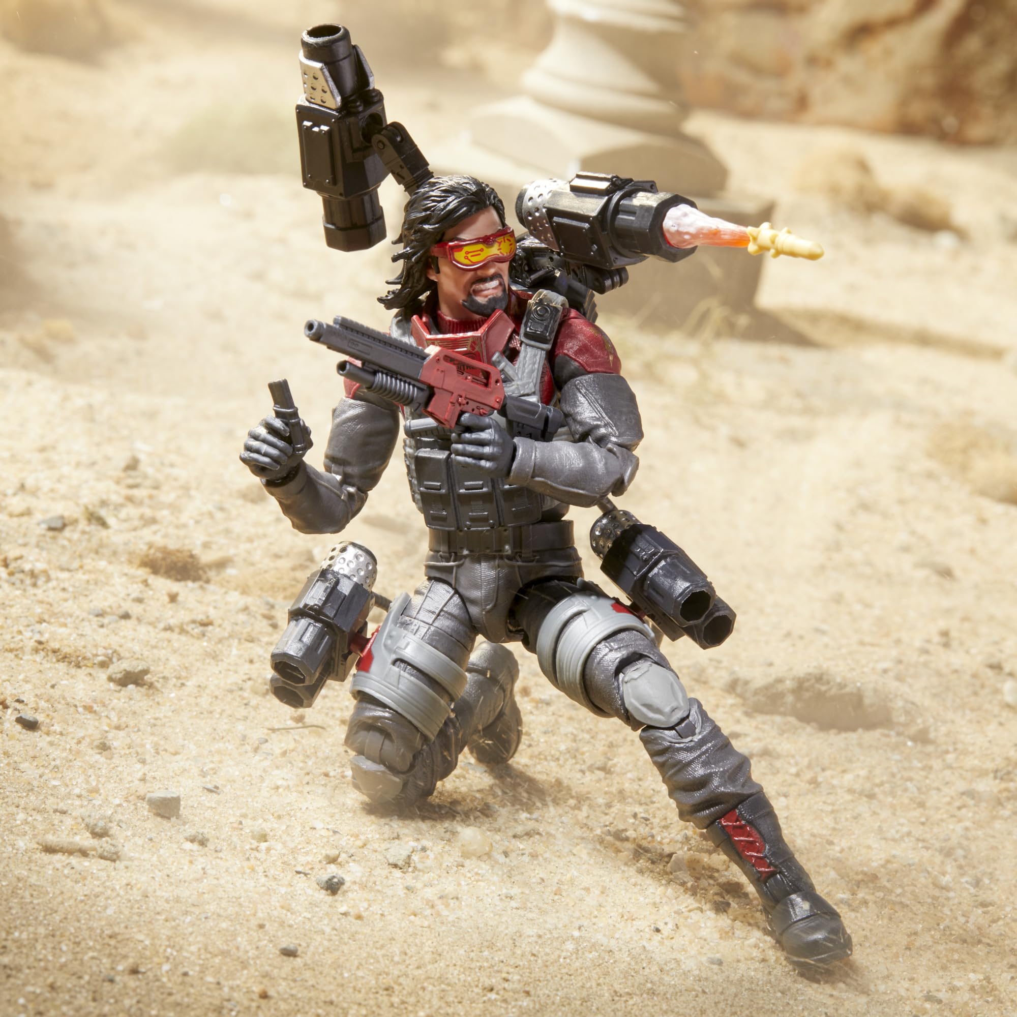 G.I. Joe Metal-Head hip-swivel holster tubes for tactical storage and display.
