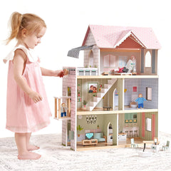 Giant bean pink dollhouse front view showing sturdy wood construction