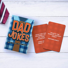Gift Republic Dad Jokes cards cover featuring 100 punny jokes for family fun.