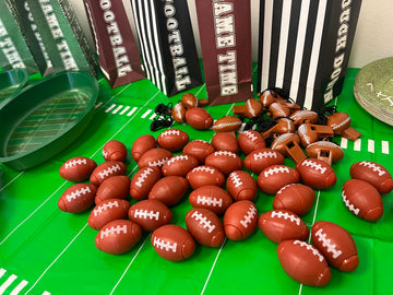 GiftExpress brown mini football fidget ideal for party favors.