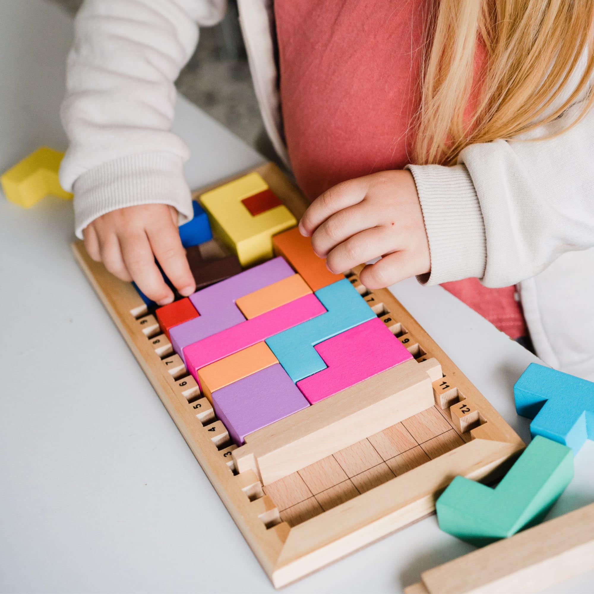 Gigamic Katamino Family wooden tray doubles as decor and play surface.