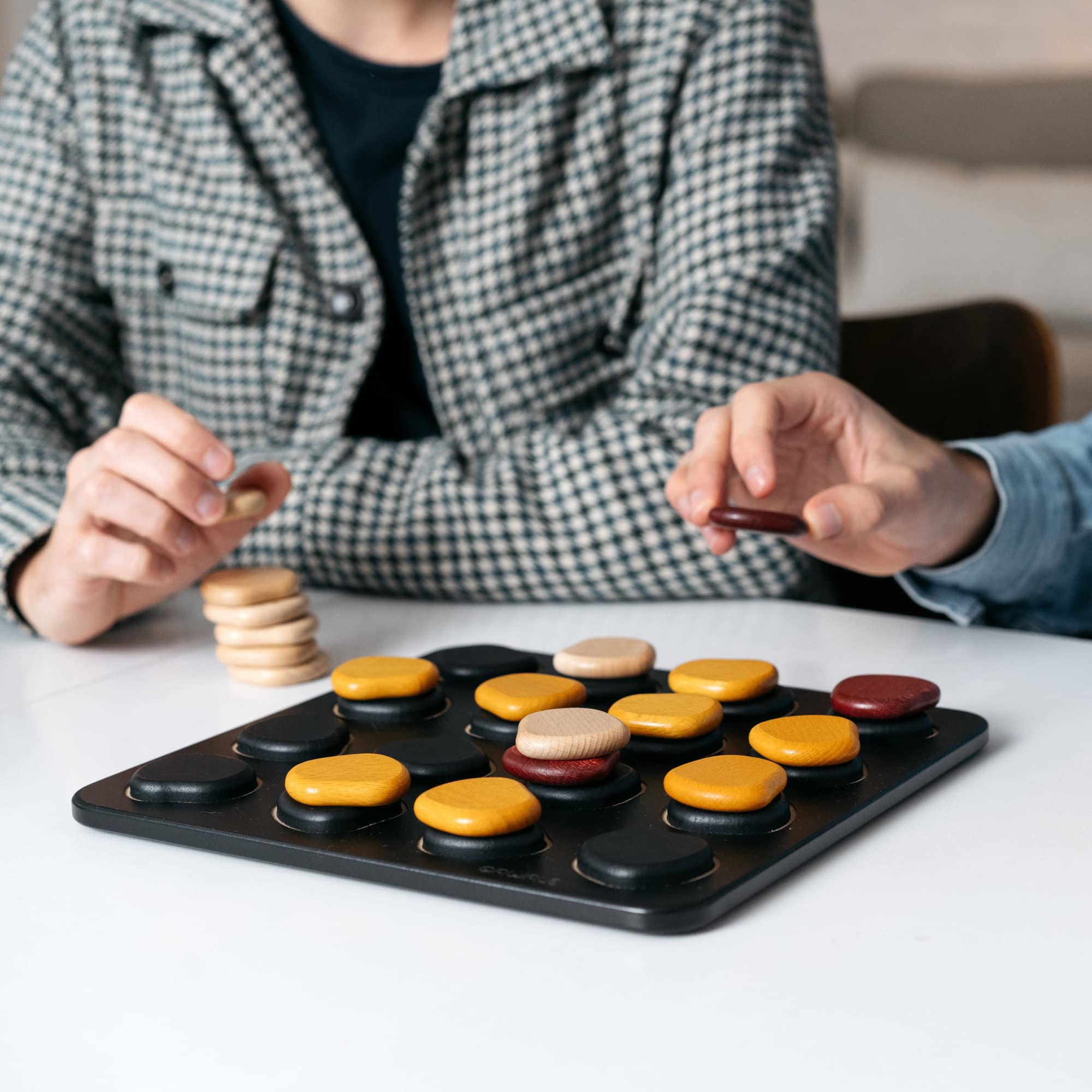 Gigamic Qawale wooden pieces close-up emphasize quality craftsmanship and durable play.