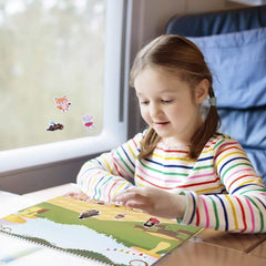 Giggles and Pebbles child using sticker pad supports creative play and fine motor skills.