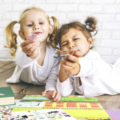 Giggles and Pebbles built-in storage keeps stickers organized inside the book.