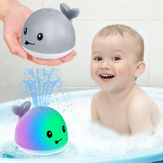 Gigilli whale bath toy lights up and sprays for playful bath time.