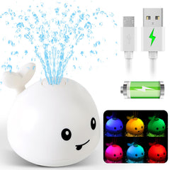 Gigilli whale bath toy sprinkler in action with water spray and colorful lights