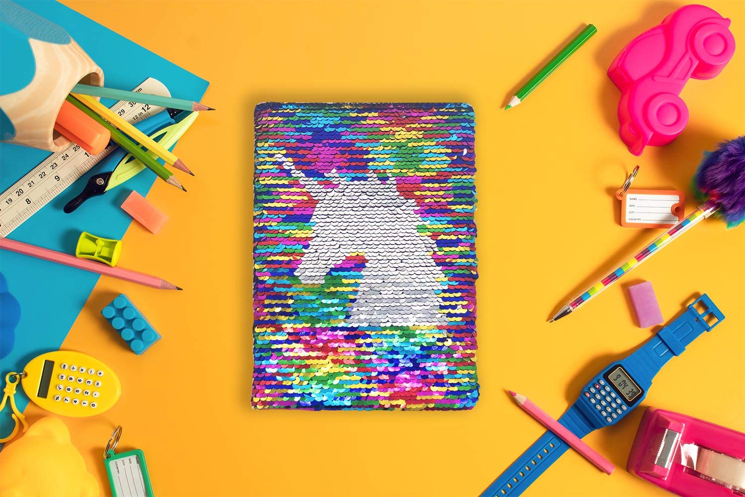 Rainbow-silver sequins invite daily writing and playful creativity.