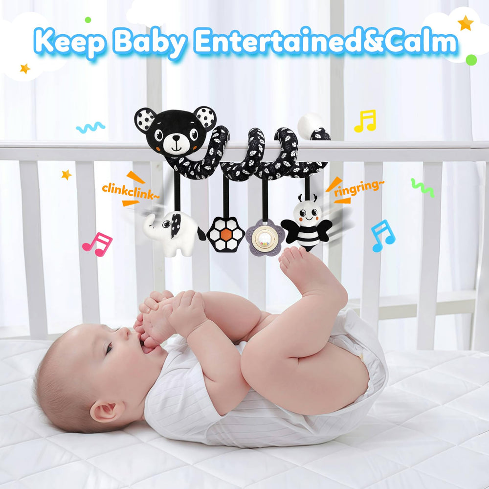 GKDOMS Beehive teether and elephant rattle entertain on car trips.