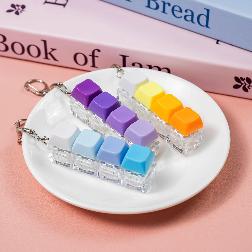 Gliging 3-piece keyboard fidget set shown with colorful gradients and texture.