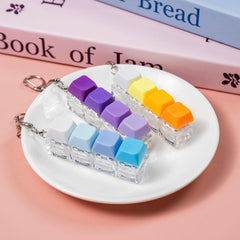 Gliging 3-piece keyboard fidget set shown with colorful gradients and texture.