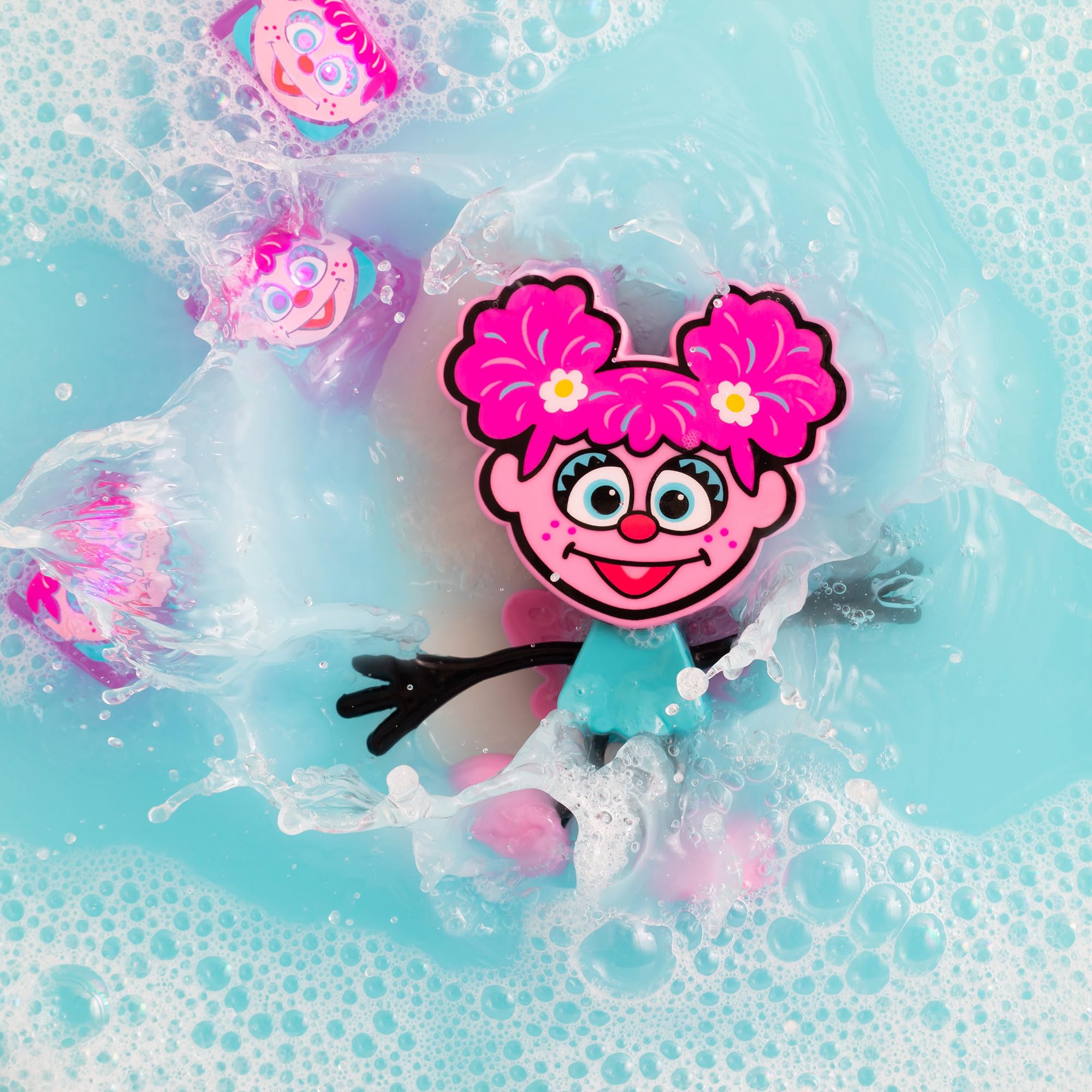 Orange light-up cubes from Glo Pals boost color recognition during bath play.