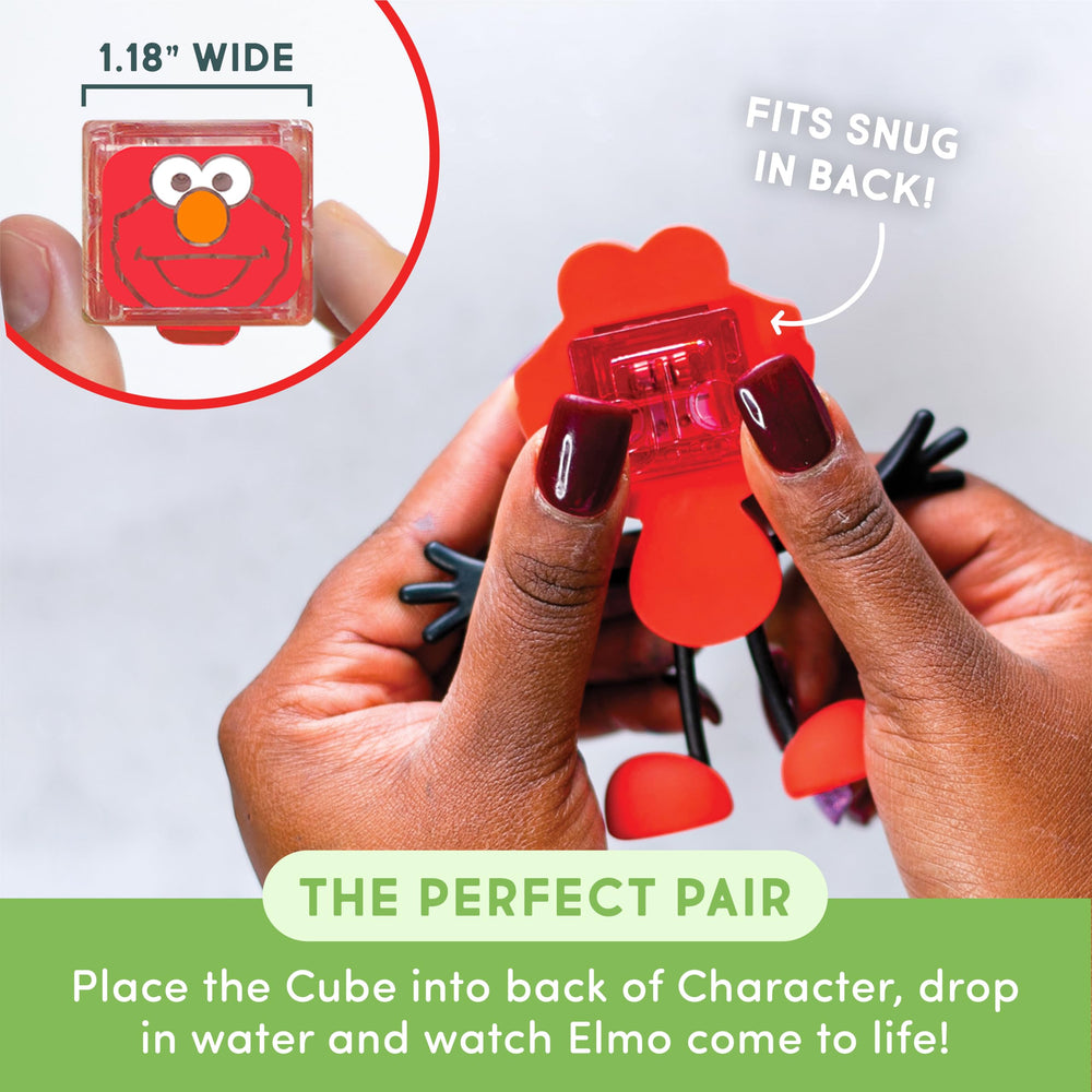 Orange light-up cubes from Glo Pals glow during water play