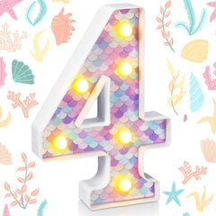 Glooglitter Mermaid LED number 4 on a table creates a warm, eye-catching centerpiece glow.